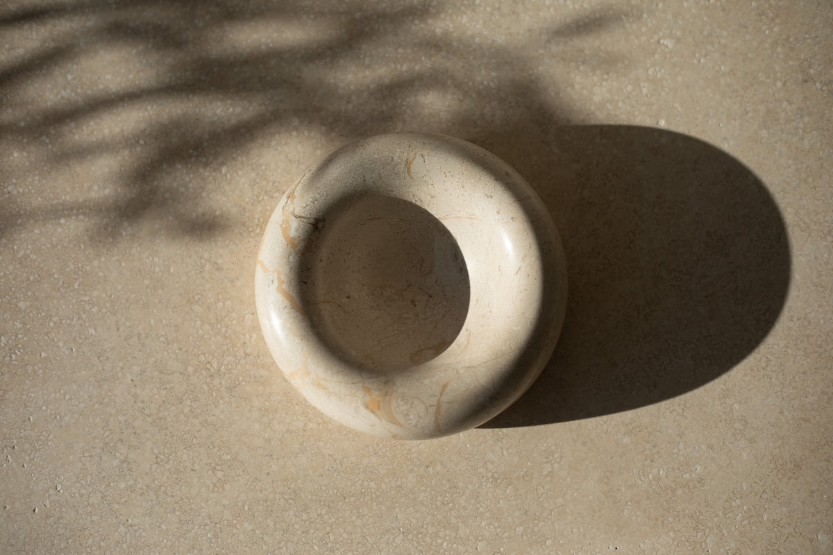 Set your keys, jewelry, and small treasures on a beautiful elegant bowl that provides organization and subtle sophitication to a coffee table, vanity, or nightstand. Crafted from marble and other precious materials, the Contour Bowl is a delicate home accessory that adds thoughtfulness to everyday items in your home.