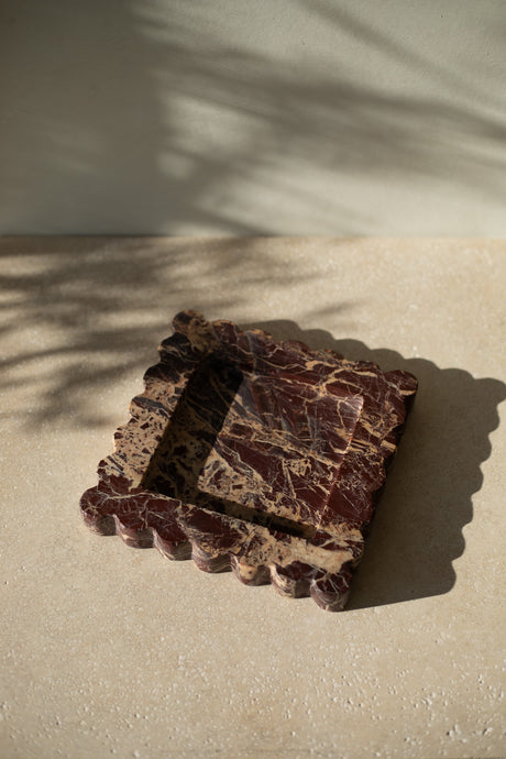 Set your keys, jewelry, and small treasures on an elegant tray  that provides organization and subtle sophistication to a coffee table, vanity, or nightstand.