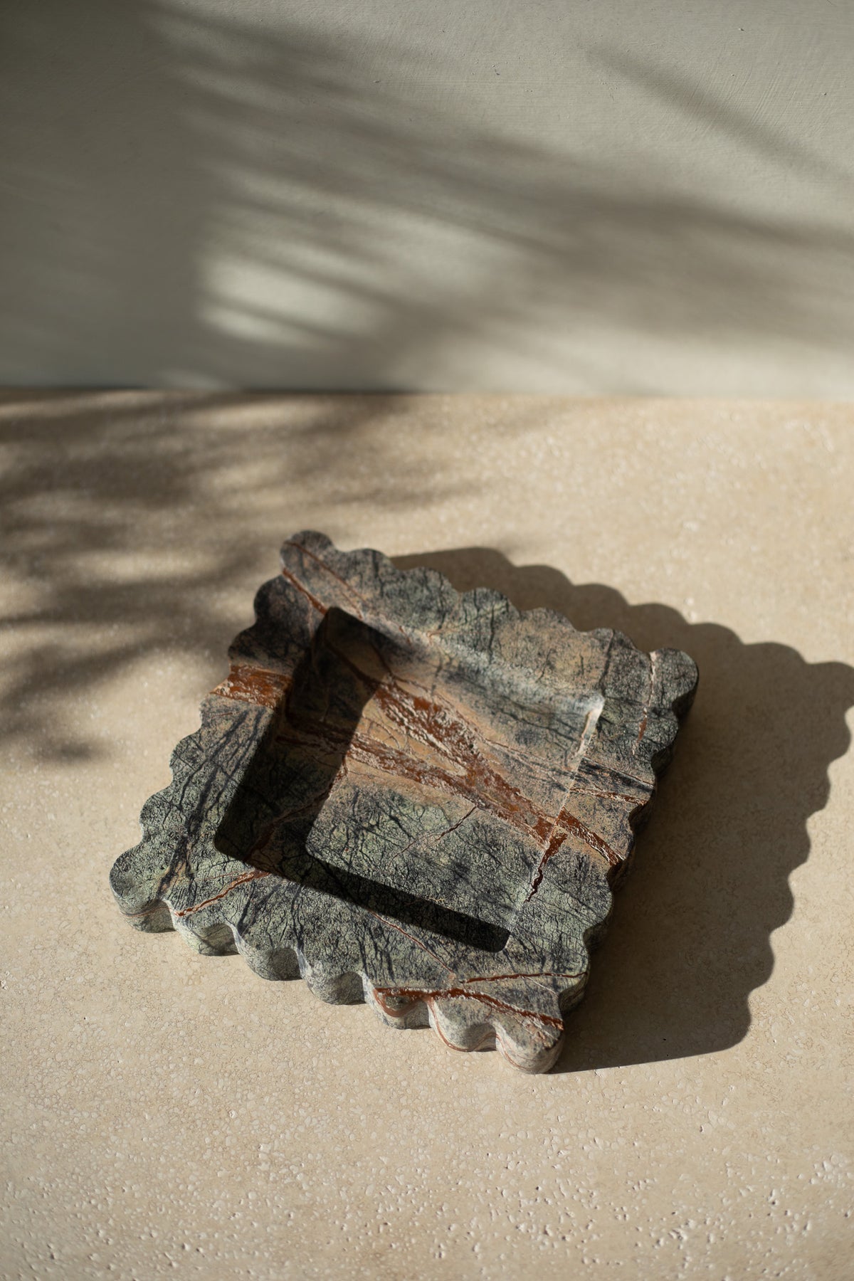 The Box Tray Seagrass by Anastasio Home, crafted from Indian Green Marble. This hand-finished, decorative tray features a unique seagrass color, ideal for organizing your coffee table or vanity.