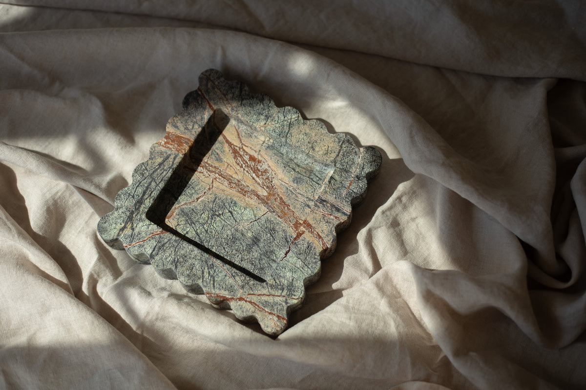 The Box Tray Seagrass by Anastasio Home, crafted from Indian Green Marble. This hand-finished, decorative tray features a unique seagrass color, ideal for organizing your coffee table or vanity.