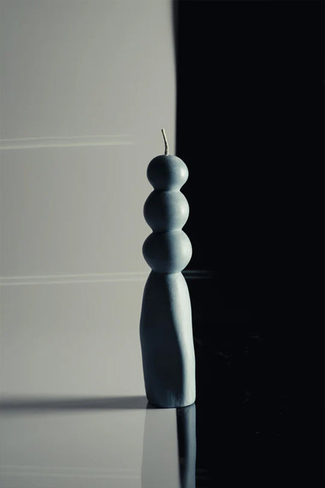 The Africa Sculptural Candle is a hand-sculpted decorative candle that can serve as a centerpiece for coffee tables, bookshelves, or nightstands. 