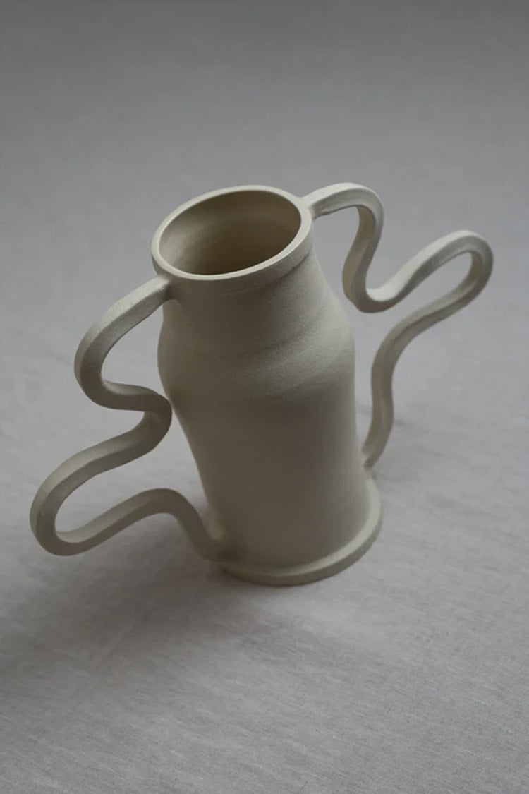 Beautiful and playful, the Curvy Amphora Vase is a piece of home art that will elevate the way you display florals and sculptural pieces in your living space.