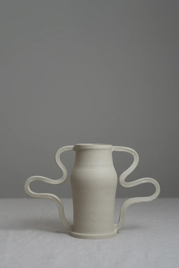 Beautiful and playful, the Curvy Amphora Vase is a piece of home art that will elevate the way you display florals and sculptural pieces in your living space.