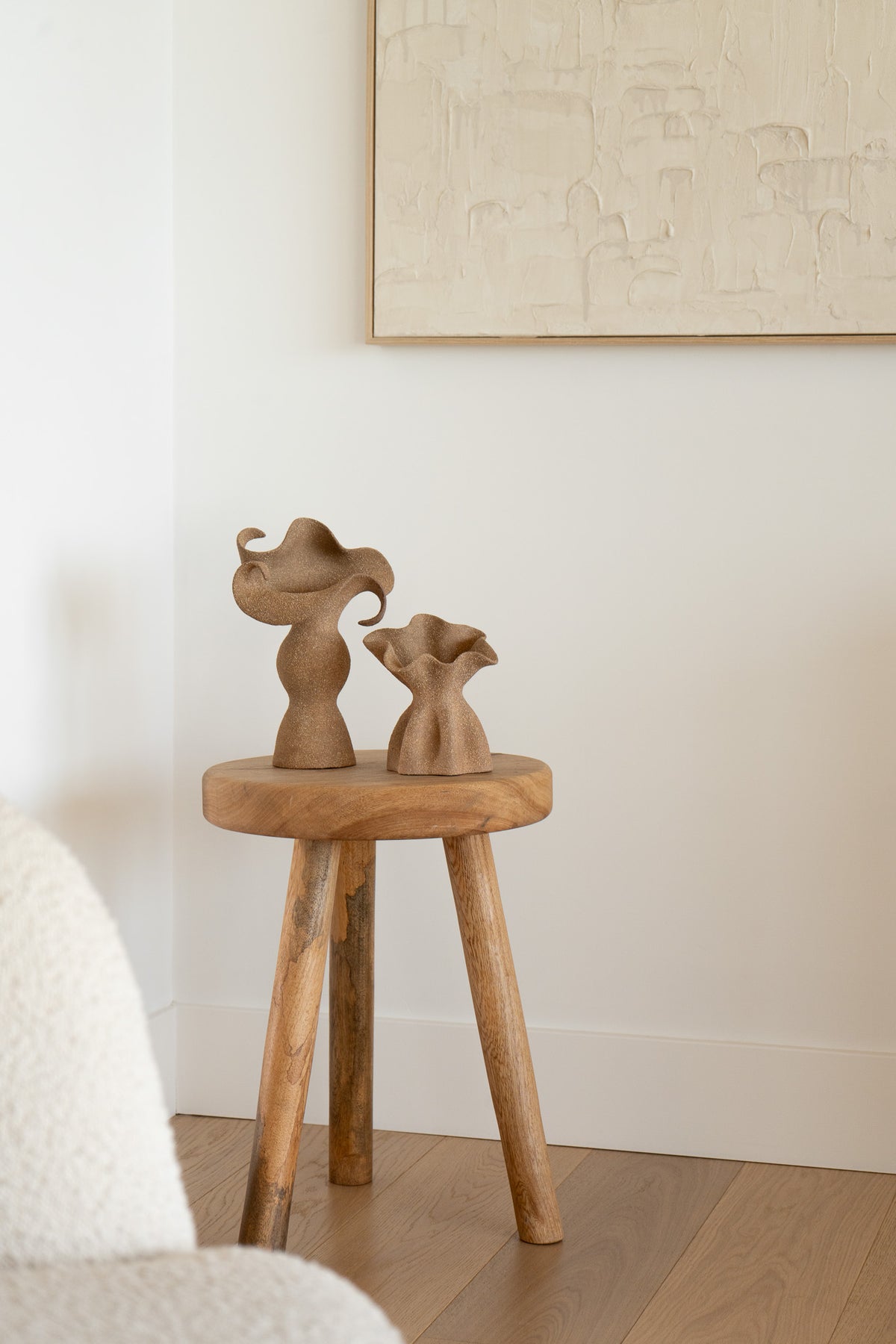 A beautifully crafted stoneware vase with curvaceous, organic outlines and soft brutalist forms. 
