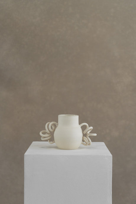 Boinggg Vase II by Kuu Pottery, featuring a whimsical design with spring-inspired handles.