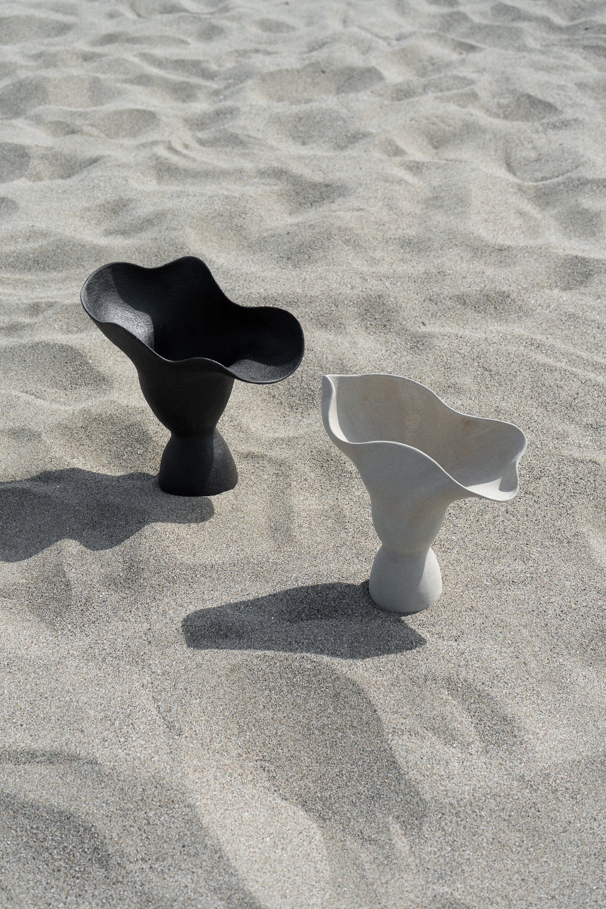 The Poesis Sculptural Vessel is a functional sculpture that elevates any floral arrangement into a stunning home decor piece.