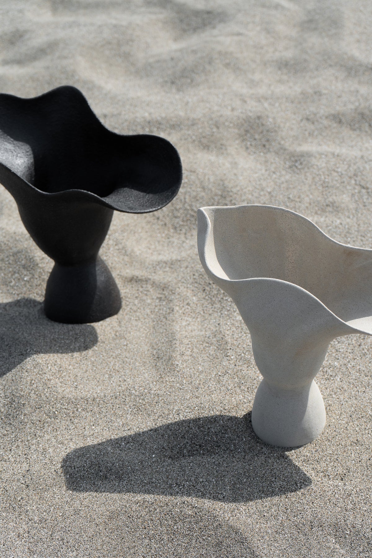 The Poesis Sculptural Vessel is a functional sculpture that elevates any floral arrangement into a stunning home decor piece.
