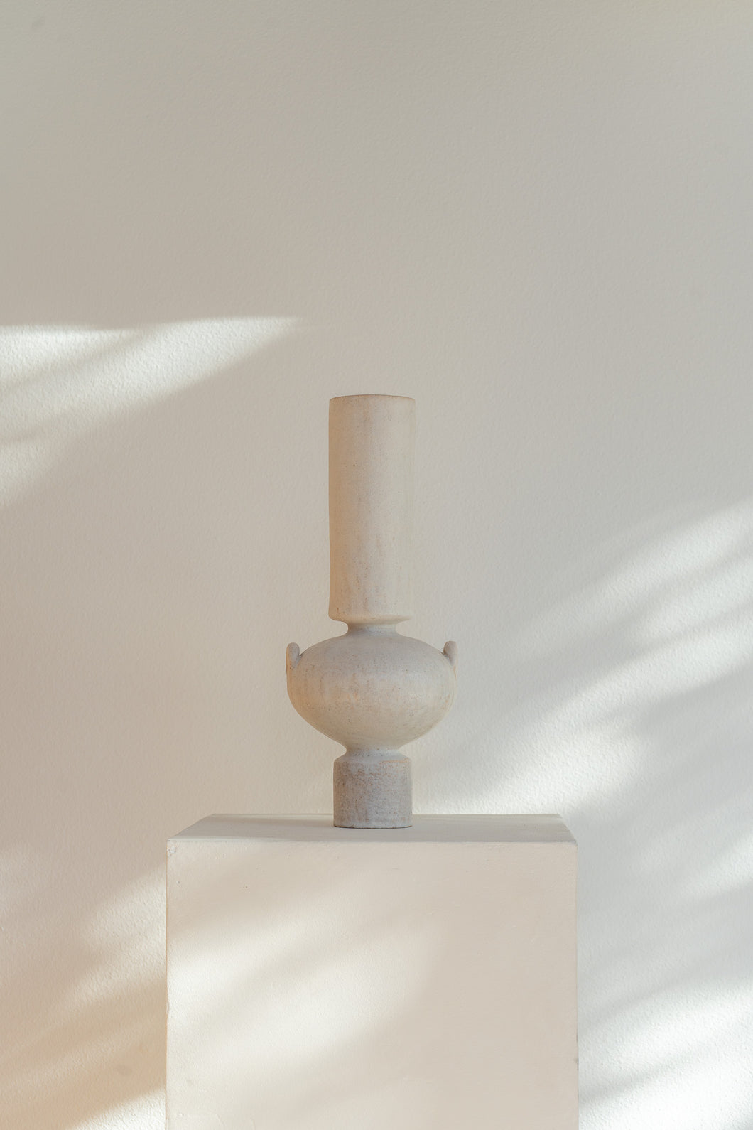 Handmade ceramic Isolated N.23 Cream vessel, matte cream glaze, textured surface inspired by ancient Mediterranean artifacts
