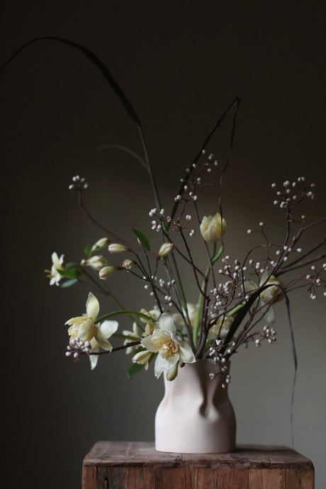 The Fluid Vase is a refined sculptural vessel that can hold your florals and greenery and add a touch of elegance to your living space. 