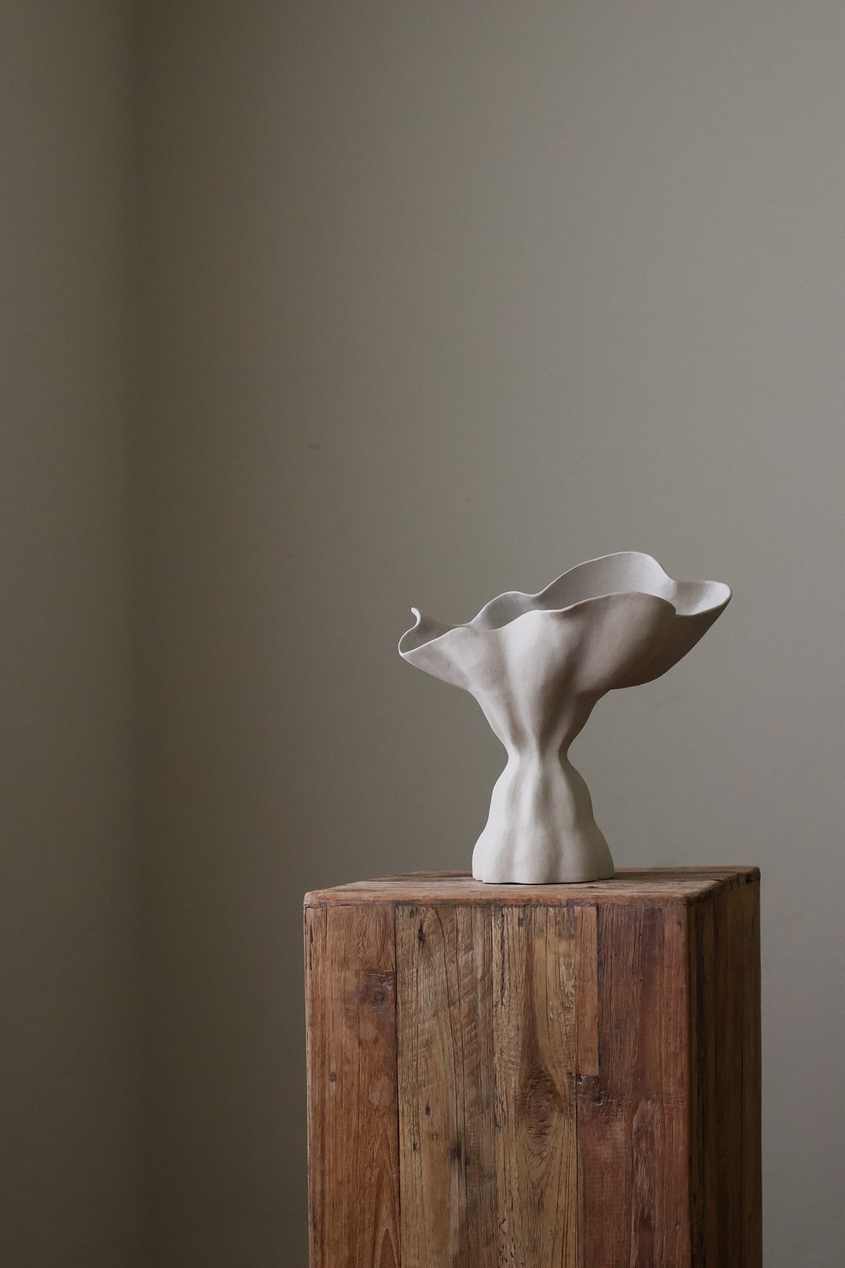Zenith Sculptural Vessel is a contrasting sculpture with a  beautiful balance of voluminous curves and soft ripples