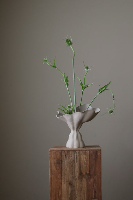 Zenith Sculptural Vessel is a contrasting sculpture with a  beautiful balance of voluminous curves and soft ripples