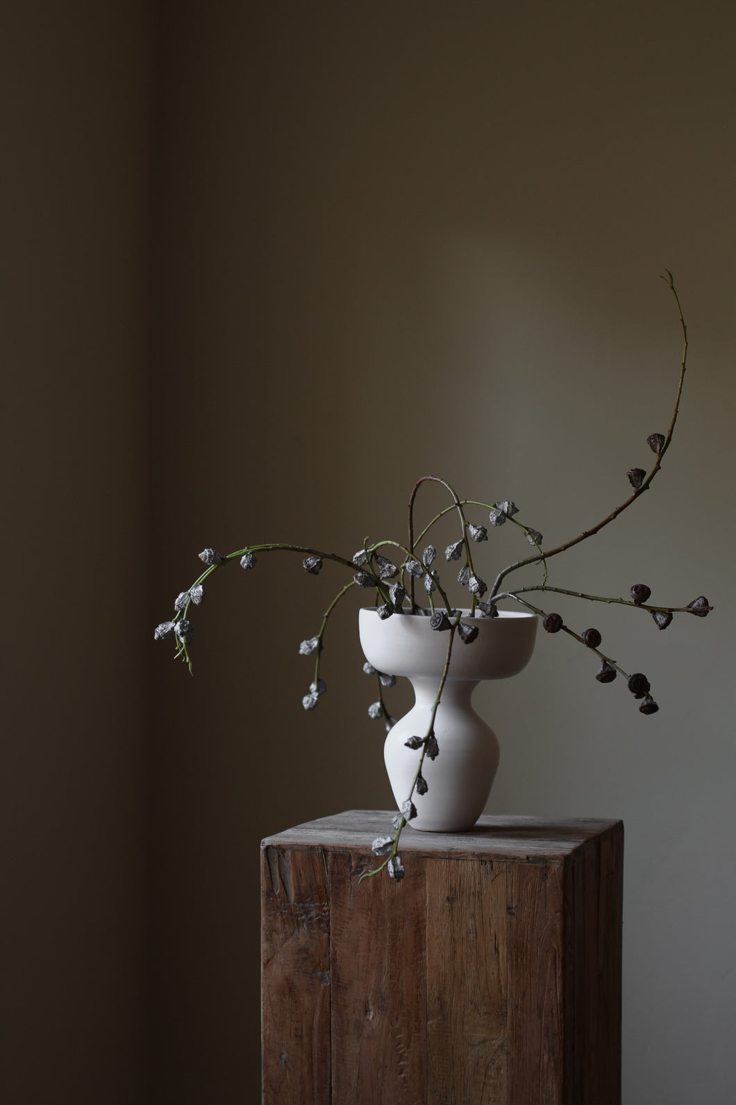 Minimalist off-white Hourglass Porcelain Vase Large, wide shallow bowl atop slender hourglass-shaped base, perfect sculptural decor accent.