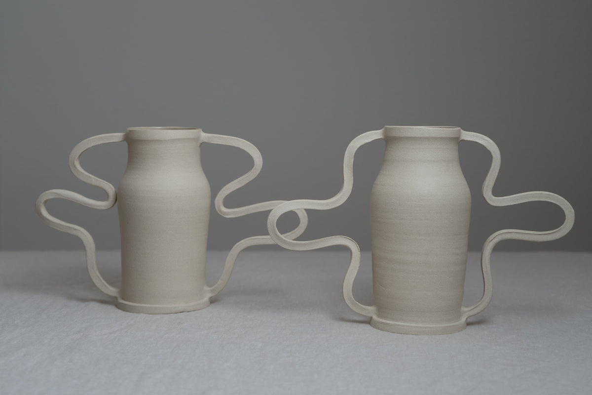 Beautiful and playful, the Curvy Amphora Vase is a piece of home art that will elevate the way you display florals and sculptural pieces in your living space. 