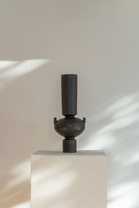 Handmade ceramic Isolated N.23 Ink vessel, black glaze and textured surface, inspired by Mediterranean artifacts.