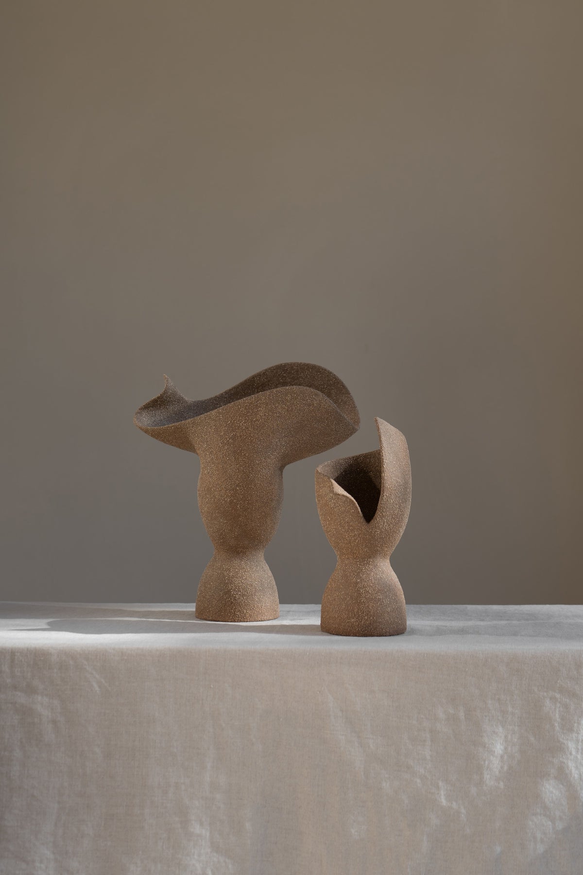 A captivating product of brutalist architecture and romantic homeware design, the Laetus Sculptural Vessel is a masterpiece that belongs in your home decor collection.