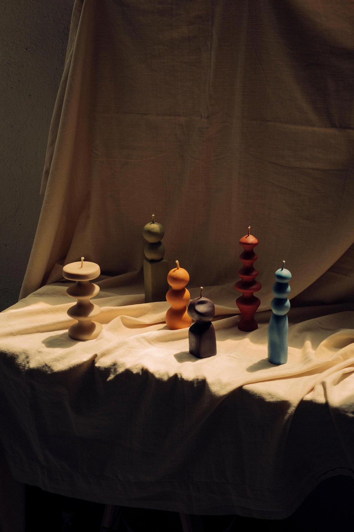Big Mutatio Gray Sculptural Art Candle Handmade By Mulier Studio. Hand Sculpted Wax Decorative Curvy Totem Pillar Candle Exclusively on INK + PORCELAIN. Artful Objects Designed by Women