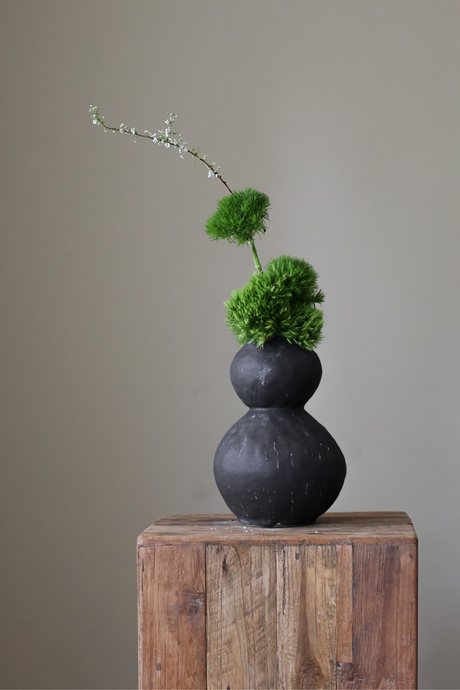 Double-sphere ceramic vase by Giselle Hicks in Speckled INK glaze, hand-pinched and uniquely sculptural — a modern, handcrafted decor piece for elegant interiors.