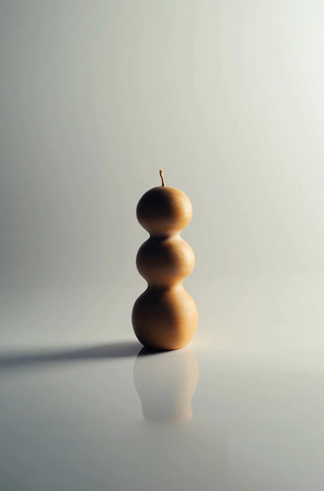 Yellow Cuerpos Sculptural Art Candle Handmade By Mulier Studio. Hand Sculpted Wax Decorative Curvy Totem Pillar Candle Exclusively on INK + PORCELAIN. Artful Objects Designed by Women